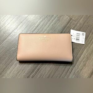 Kate Spade Schuyler Large Slim Bifold Wallet in Light Beige